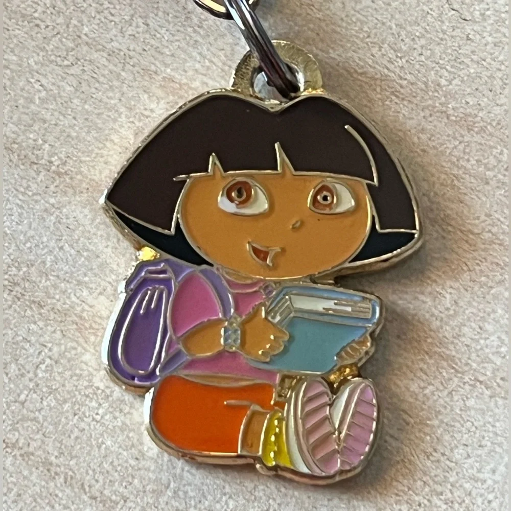Nickelodeon Dora the explorer kids bracelet with 6 enamel characters.